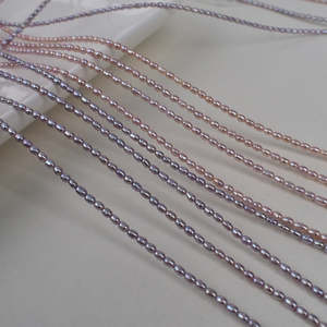 1057 Petites perles de riz violet d'eau douce de 2-3 mm, assortiment naturel de petites perles de 2-3 mm - Product Image 1