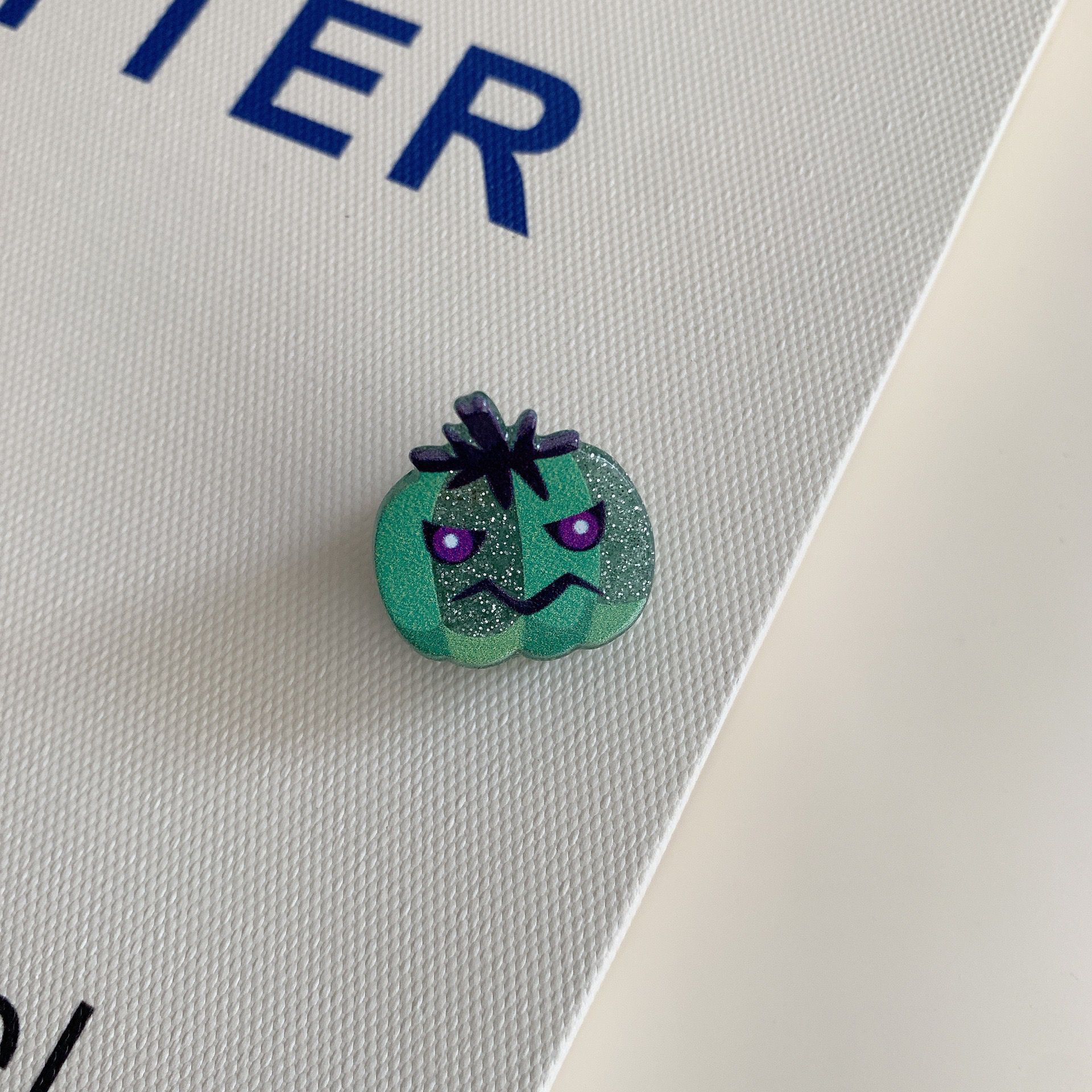 Pince à cheveux citrouille verte maléfique