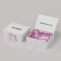 Boîte à perruque personnalisée de haute qualité avec logo, ruban rose, nœud, revêtement UV gaufré et fermeture magnétique pour emballage cadeau de cheveux