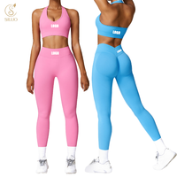 Nouveaux ensembles de sport pour femmes : Soutien-gorge de sport respirant sans dos avec logo personnalisé sur le devant et leggings taille haute effet push-up pour le yoga