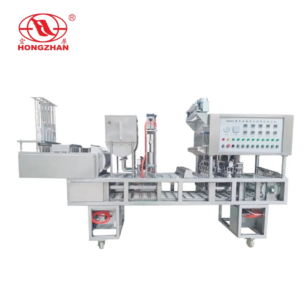 Completamente automatico vassoio gelatina marmellata tazza di plastica succo acqua minerale tè yogurt tazza di riempimento e sigillatura riempitivo macchina sigillante