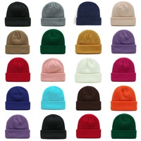 Gorro de invierno al por mayor para hombre y mujer, gorro tejido con etiqueta de parche tejido.