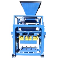 Machine à blocs de béton vibrée manuelle QT4-35 pour la production de briques creuses et de blocs pleins