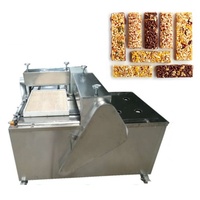 Machine de fabrication de barres protéinées aux céréales, de bonbons aux cacahuètes et de galettes de graines de sésame