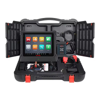 Outil de diagnostic MaxiSys Ultra EV, comprend tous les adaptateurs, station d'accueil, et étui de transport pour une utilisation professionnelle en atelier.