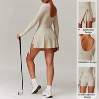 Ensemble de tenue de sport 2-en-1 pour femme : jupe de tennis unie sans dos et combinaison de sport à manches longues avec short intégré