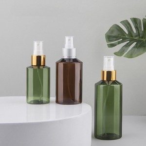 Vacío 100mL-500ml 200ml 250ml Hombro oblicuo Verde Marrón PET Botella de plástico para peluquería de agua con bomba de pulverización de aluminio - Product Image 1