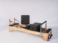 Precio de Fábrica Clásico Reformer de Pilates con Estructura de Madera de Roble para Entrenamiento de Fuerza Central y Ejercicio de Pilates