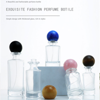 Nouveau design, flacon de parfum en verre cylindrique haut de gamme de 50 ml avec pulvérisateur à pompe, impression sur écran, emballage personnalisé