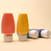 Nuevo Color personalizado plegable Squeeze cosmético 100ML silicona loción champú botella viaje botella conjunto