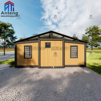 Maison conteneur extensible et pliable en bois grainé avec terrasse et auvent, 2 chambres, villa préfabriquée pour les vacances en famille et la vie en plein air