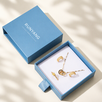Ensemble d'emballage de bijoux personnalisé OEM avec boîte cadeau bleu clair et pochette à fermeture à bouton pour boucles d'oreilles, colliers et présentation en magasin