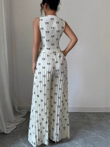 Completo coordinato due pezzi da <span class=keywords><strong>donna</strong></span> bianco e nero con stampa a fiocco: gilet senza maniche con scollo a V e bottoni e pantaloni a gamba larga a vita alta plissettati – Outfit estivo - Product Image 2