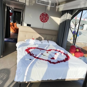 บ้านคอนเทนเนอร์สมัยใหม่สำหรับใช้เป็นโรงแรม พร้อมหน้าต่างขนาดใหญ่และพื้นระเบียงไม้สำหรับพื้นที่ใช้สอยกลางแจ้ง - Product Image 2