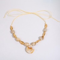 Collier en corde tressée à la main avec pendentif en fausse coquille d'ivoire blanc, étoile de mer et conque - Bijoux de plage NK29630