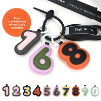 Porte-clés en cuir PU avec initiale 26 lettres, breloque de sac personnalisée avec monogramme, accessoire tendance pour clés de voiture, cadeau en gros