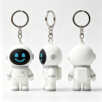 Porte-clés en silicone 3D Astronaute personnalisé OEM ODM, breloque de sac périphérique tendance Cyber Tech avec design IP personnalisé