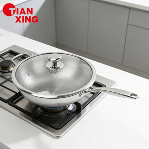 TIANXING Padella Premium in Titanio Puro con Rivestimento Antiaderente, Padella Martellata in Titanio Senza Rivestimento, Grande Wok Professionale Compatibile con Induzione - Product Image 1