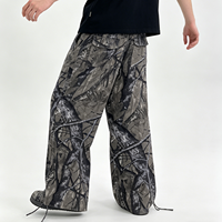 Pantalon cargo camouflage en bois pour homme, coupe large, en ripstop, taille élastique, passants de ceinture, poches à rabat, cordon de serrage réglable, bas de jambe ajustable, vente en gros