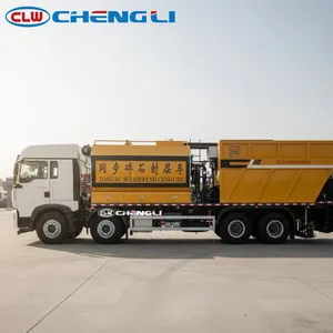 Camion pulvérisateur de granulats synchronisé Howo 8x4 avec réservoir d'asphalte de 11 000 L et réservoir de granulats de 15 000 L pour la construction routière et l'étanchéité des graviers - Product Image 3