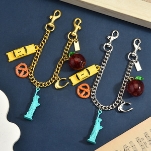 Cadena de Moda Vintage para Bolsos, Dijes <span class=keywords><strong>con</strong></span> Forma de Estatua de la Libertad, Manzana y Pan, Llavero de Adornos Colgantes para Coche <span class=keywords><strong>Estilo</strong></span> Retro Americano - Product Image 1