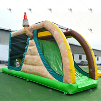Château gonflable commercial T-Rex Dinosaure avec toboggan et zone de saut, pour événements extérieurs et location pour fêtes d'enfants