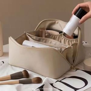 Ulikeke Wholesale Custom Logo Waterproof Toiletry Cosmetic Bags PU Leather <b>Pillow</b> Cosmetic Travel Makeup Bag With Zipper - Product Image 4