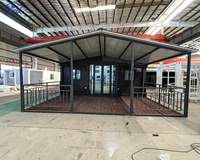 Maison conteneur extensible de 40 pieds à plafond haut avec porche avant à toit en pente supplémentaire, 3 chambres, 1 salle de bain