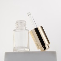 Flacon compte-gouttes en verre de luxe 10ml 15ml 20ml 30ml Flacon vide pour huile essentielle Sérum Transparent Flacon compte-gouttes en verre rotatif à pression