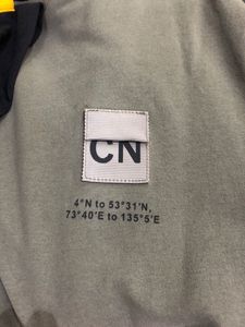 Factory wholesale prices on inexpensive woven neck tags sewn onto customizable fabric with your own logo. Fast shipping - Product Image 4