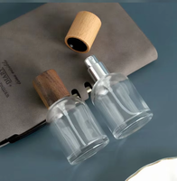 Vente en gros de flacons de parfum ronds en verre transparent de 15 ml, 30 ml, 50 ml, flacon vide pour cosmétiques et parfums avec bouchon pompe et boîte cadeau