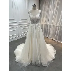 Factory Modest Champagne A Line Bridal Gown Elegant Woman Luxury Boat Neck Pearls Beaded Wedding Dresses from China