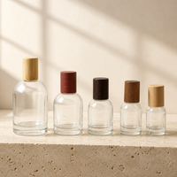 Flacon de parfum minimaliste en verre transparent avec bouchon en bois, gamme complète de volumes multiples, flacon vide rond pour parfum