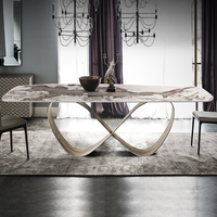 Table à manger dorée et dorée en forme de papillon, sur mesure, luxueuse, en pierre frittée