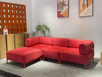 Canapé modulaire sectionnel en velours orange circulaire, convertible et rembourré, style moderne minimaliste en forme de L pour salon