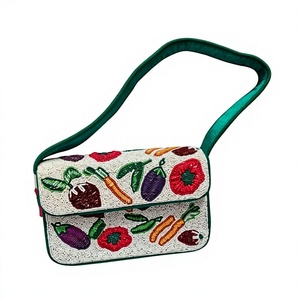 กระเป๋าถือสะพายข้าง MS Handicraft รุ่น MS-WC-001 ทำมือประดับลูกปัดสีขาว พร้อมลายปักผัก สายสะพายสีเขียว จากอุตรพัฎฐ์เบรษฐ์ - Product Image 1