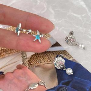Pendientes de acero de titanio con estrella de mar de concha de playa para mujer, sin necesidad de quitar, diseño de nicho, simple, dulce y versátil - Product Image 1