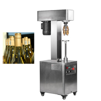 Machine manuelle de scellage de bouchons de bouteilles de vin pour fermer les bouteilles en verre avec un bouchon en aluminium