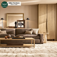 Canapé d'angle en forme de L au design moderne et élégant pour salon, avec structure en bois massif et coussins rembourrés en éponge