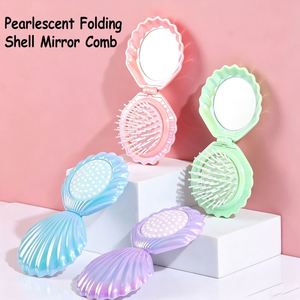 Nouveau peigne pliant nacré multifonctionnel portable pour maquillage et coiffure, avec coussin d'air pour démêler les cheveux - Product Image 1