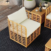 Ensemble de salon de jardin en rotin de style nordique avec table basse, structure métallique, chaises décontractées imperméables et résistantes aux UV pour villas et jardins