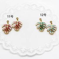 Nouveautés FSSCM-10 : Breloques émaillées florales coréennes mignonnes, pendentifs dorés en forme de fruits, lettres et feuilles tropicales, breloques cadeaux pour la Fête des Mères