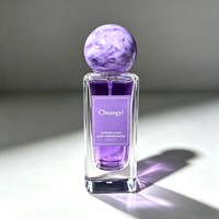 Flacon pulvérisateur de parfum en verre transparent exquis avec bouchons colorés 30/50/100ml, atomiseur de parfum vide, logo personnalisé