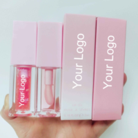 Vente en gros de gloss à lèvres transparent de haute qualité, naturel et végétalien, avec logo et emballage personnalisés, effet repulpant, teinte longue tenue, huile fruitée