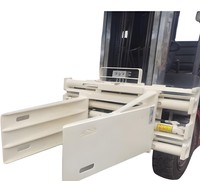 Pince à balles textile spécifique pour lin, à bras allongés et extrémités arrondies, adaptée aux balles de lin et aux déchets textiles