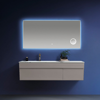 Meuble-lavabo minimaliste moderne à fermeture en douceur avec charnière et simple vasque en céramique avec miroir LED