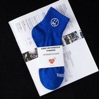 Chaussettes mi-mollet en coton pour hommes, motif visage souriant, broderie tendance, basses, corset, respirantes et absorbant la transpiration, pour le sport
