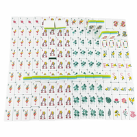 Un ensemble de 160 tuiles de Mahjong en provenance des États-Unis, avec un motif de dos en perles acryliques sur le thème d'une plage tropicale