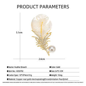Broche en plumes de haute qualité en gros, plaquée or/argent, avec coquillage naturel et perle blanche, épingle en métal en forme de feuille - Product Image 3