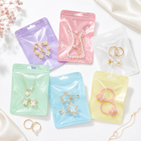 100 pièces/sac Sachets holographiques en Mylar à fermeture éclair pour bijoux, poudres, aliments secs, noix, bonbons, emballage irisé